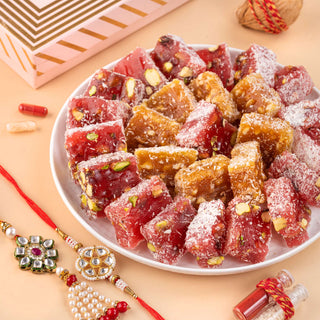 Pomegranate Pistachio Turkish Delight Sweets with 2 sets of Kundan Rakhi and other Rakhi Essentials Sweet