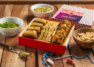 Rakhi Assorted Sweets Box 250g with 2 set of Kundan Rakhi & Rakhi Essentials