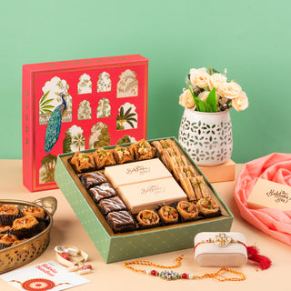 Assorted Baklavas in Peacock Elegance Box with 2 sets of Rakhi (580gms) - THE BAKLAVA BOX