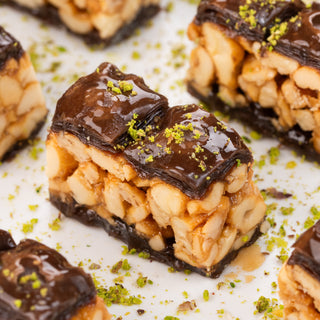 Assorted Baklavas in Peacock Elegance Box with 2 sets of Rakhi (580gms) - THE BAKLAVA BOX