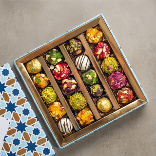Assorted Indian Fusion Sweets on a stone surface, premium gift