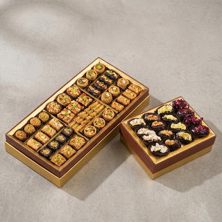 Sunheri Assorted Baklava and Stuffed Dates Hamper on a stone surface, premium gift
