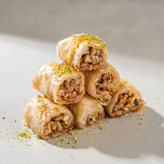 Kitta baklava, rolled walnut phyllo with honey