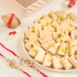 Pistachio Kaju Katli with a set of 2 Rakhis & Greeting Card - 300 gm - THE BAKLAVA BOX