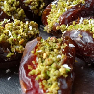 Pistachio stuffed Medjool dates close-up detail